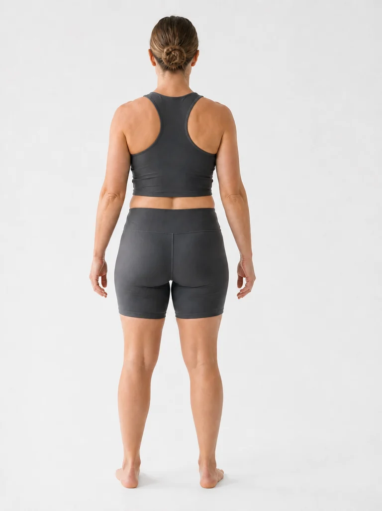 23 percent body fat female back view with toned shoulders and fuller hips