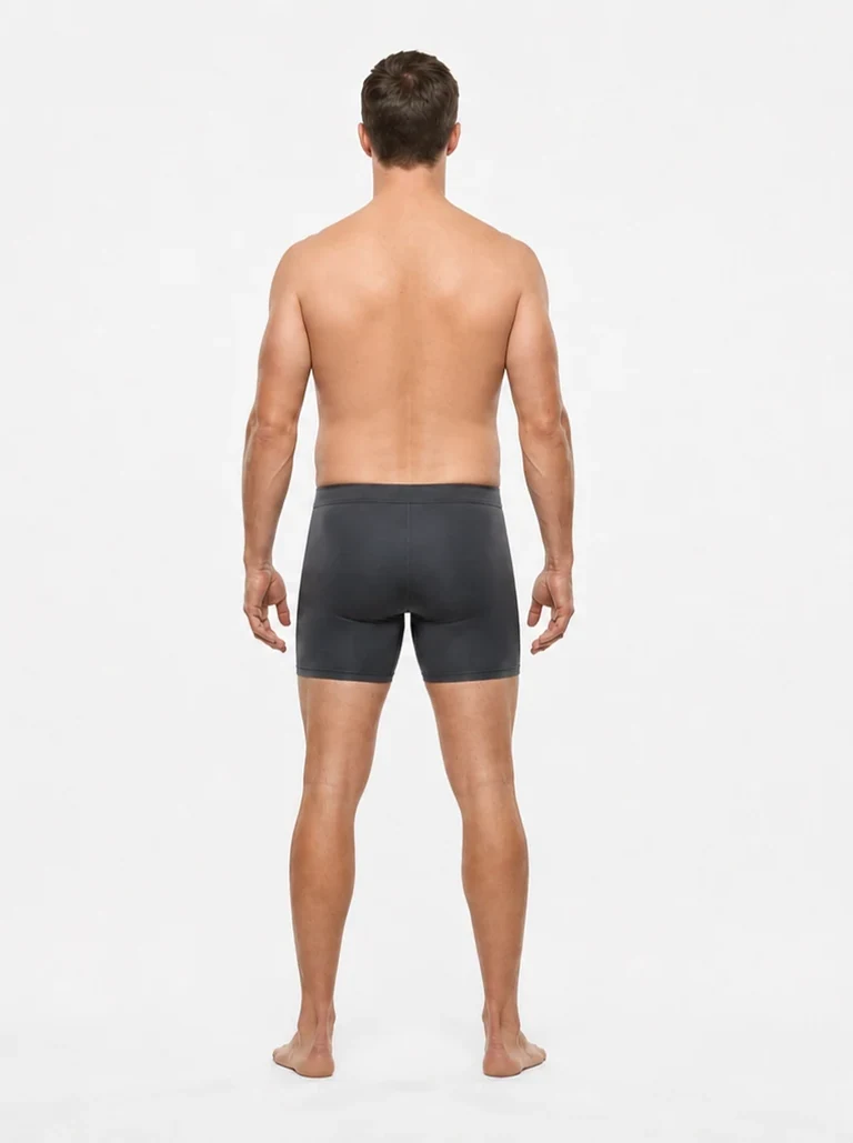 18 percent body fat male back view with mild lower-back softness