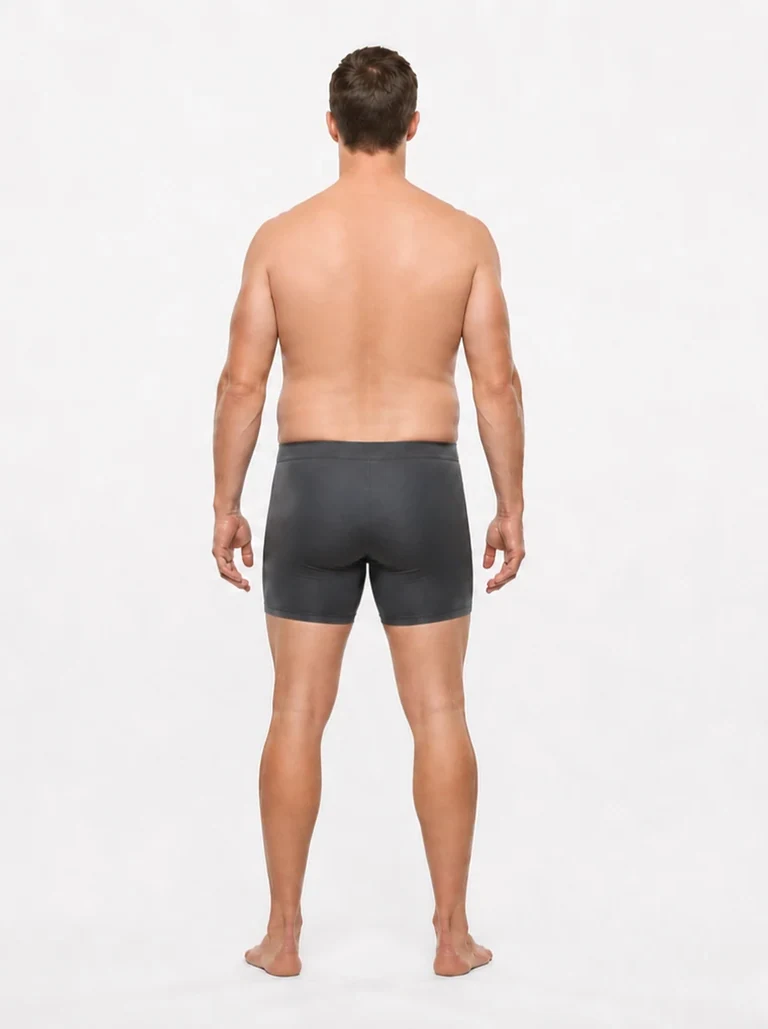 25 percent body fat male back view with visible lower-back softness